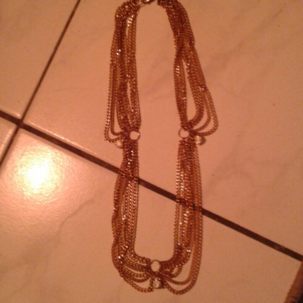 Vintage gold layered shiny necklace with rhinestones in excellent condition